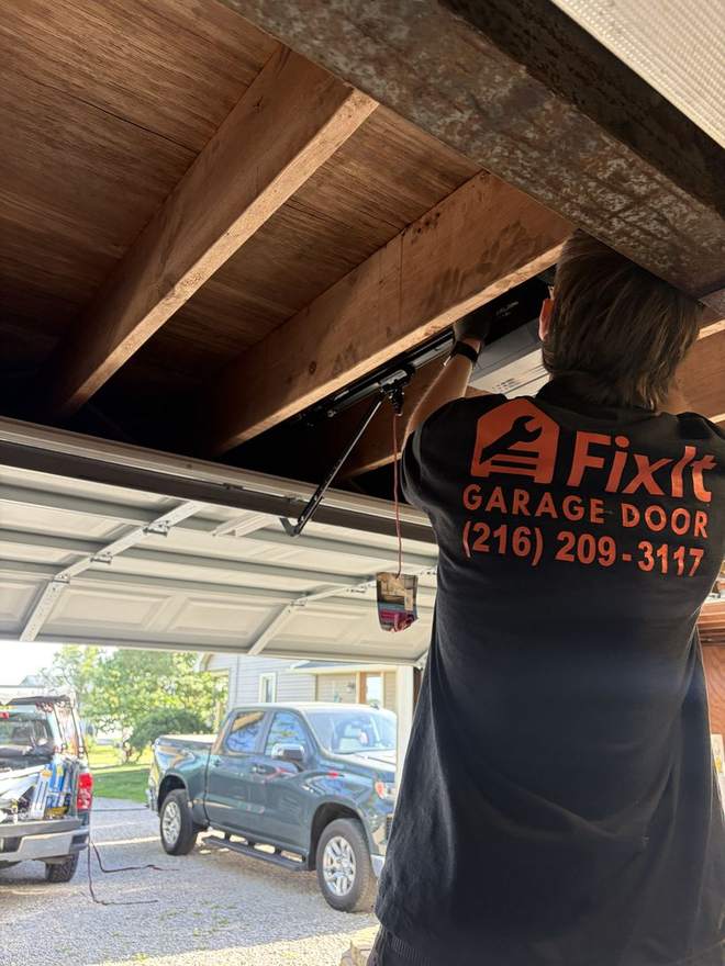 FixIt technician servicing a garage door opener
