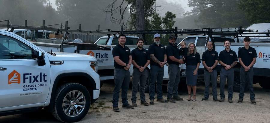 FixIt Garage Door service team with branded trucks