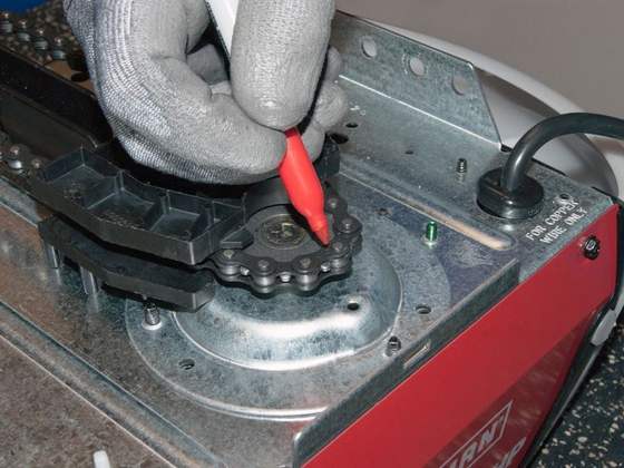 Garage door opener gear and sprocket repair close-up